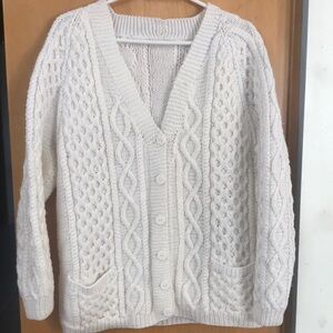 White hand crafted aran cable knit vneck button cardigan